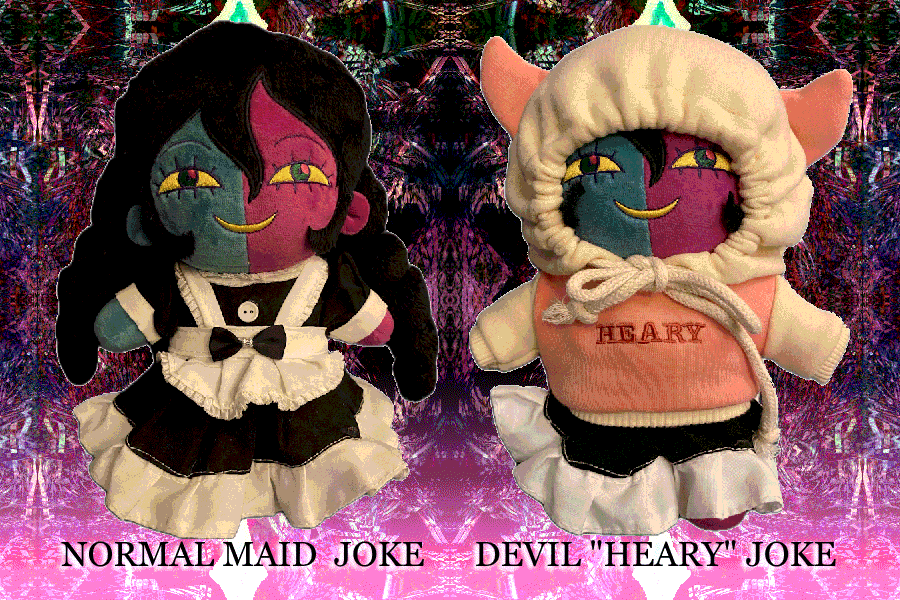 Joke Doll, one wearing maid dress and one wearing hoodie that says "heary"